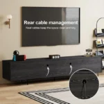 mid century inspired black media console with slatted wood doors 6