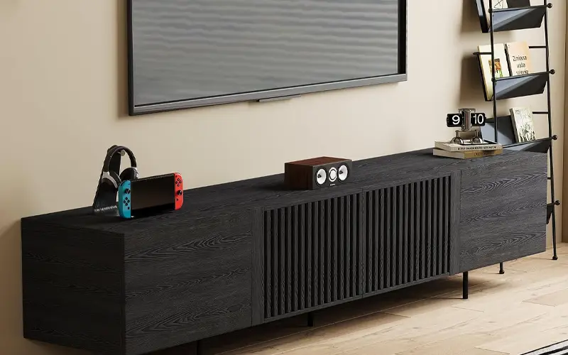 mid century inspired black media console with slatted wood doors feature 2